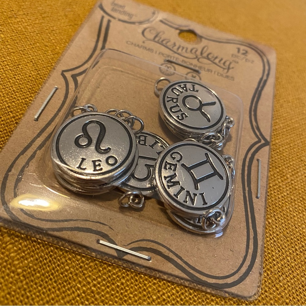 Charmalong’s Silver Zodiac Charms.  Set 12 pc